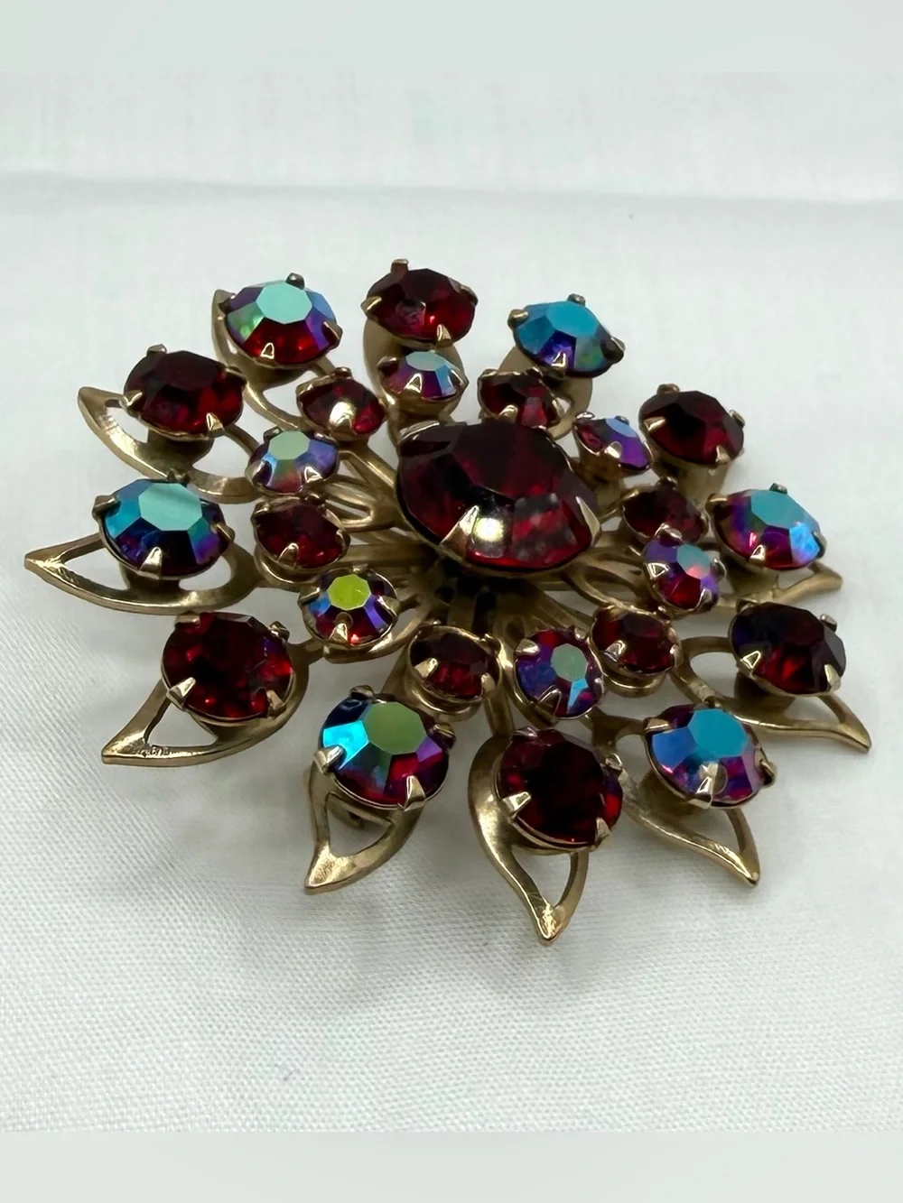 Vintage Starburst Brooch Pin Goldtone Faceted Deep Red Iridescent Rhinestones